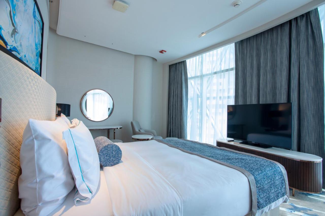 Century Marina Hotel - Lusail Екстериор снимка A bedroom at the hotel