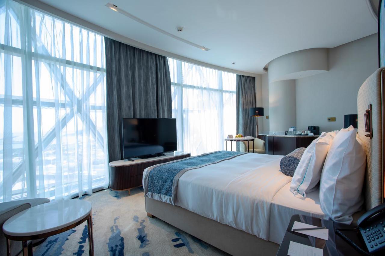 Century Marina Hotel - Lusail Екстериор снимка A bedroom at the hotel