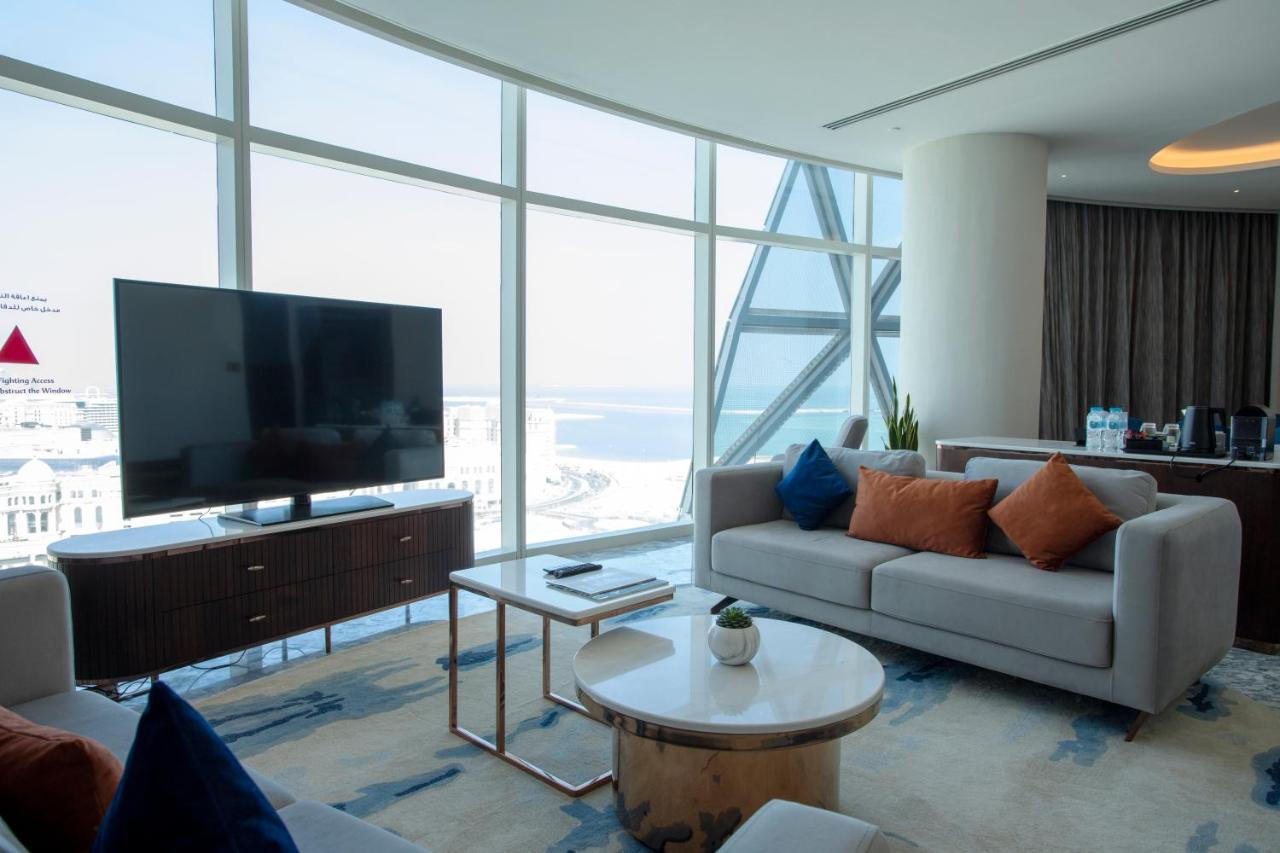 Century Marina Hotel - Lusail Екстериор снимка A living room in a suite at the hotel